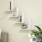Modern white wall shelf set with books, decor, and plant in contemporary living room