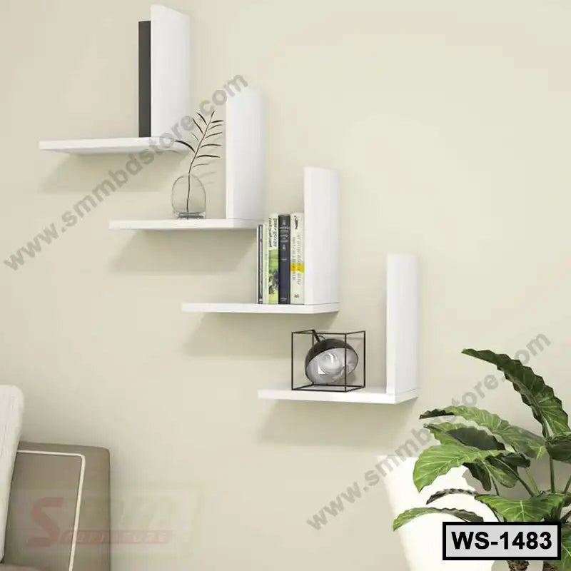 Modern white wall shelf set with books, decor, and plant in contemporary living room