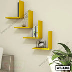 Modern yellow wall shelves with decor and books in a living room interior