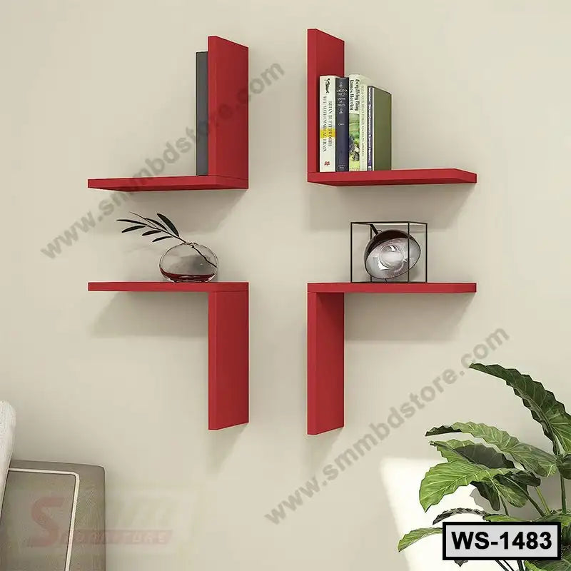 Modern red wall shelves set on beige wall, decorated with books, vase, and decor items