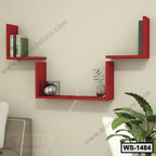 Modern red wooden wall shelf with books and decor in a living room interior