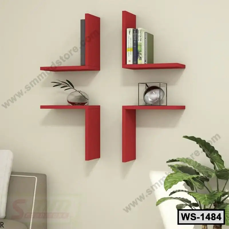 Modern red wall shelves set with books and decor, mounted on a beige living room wall