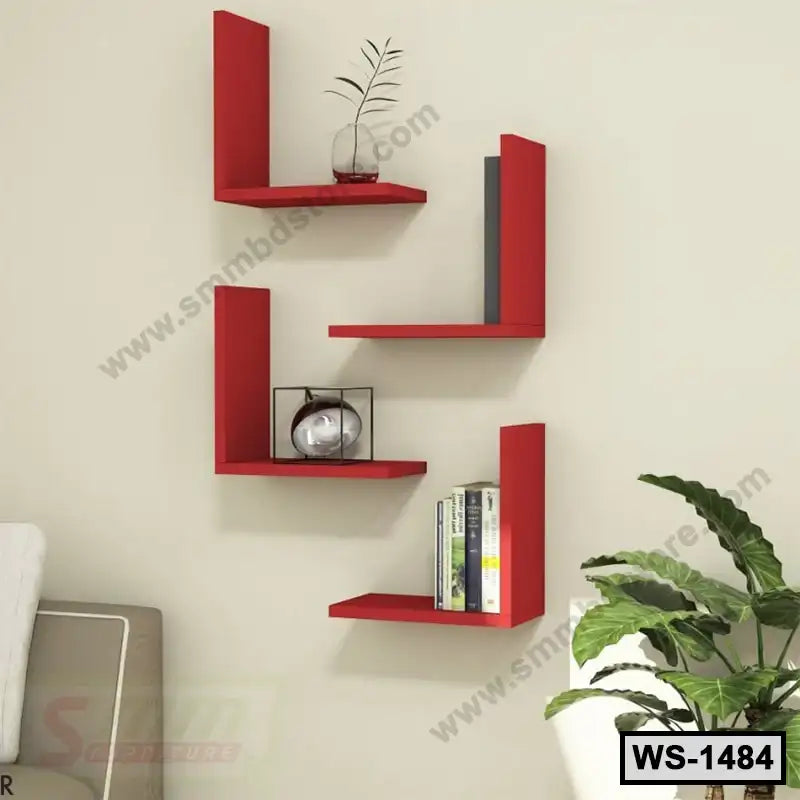 Modern red wall shelf set mounted on beige wall, displaying books and decorative items in a living room.