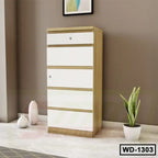 Modern wooden wardrobe with white drawers in a home interior, next to plants and decor.