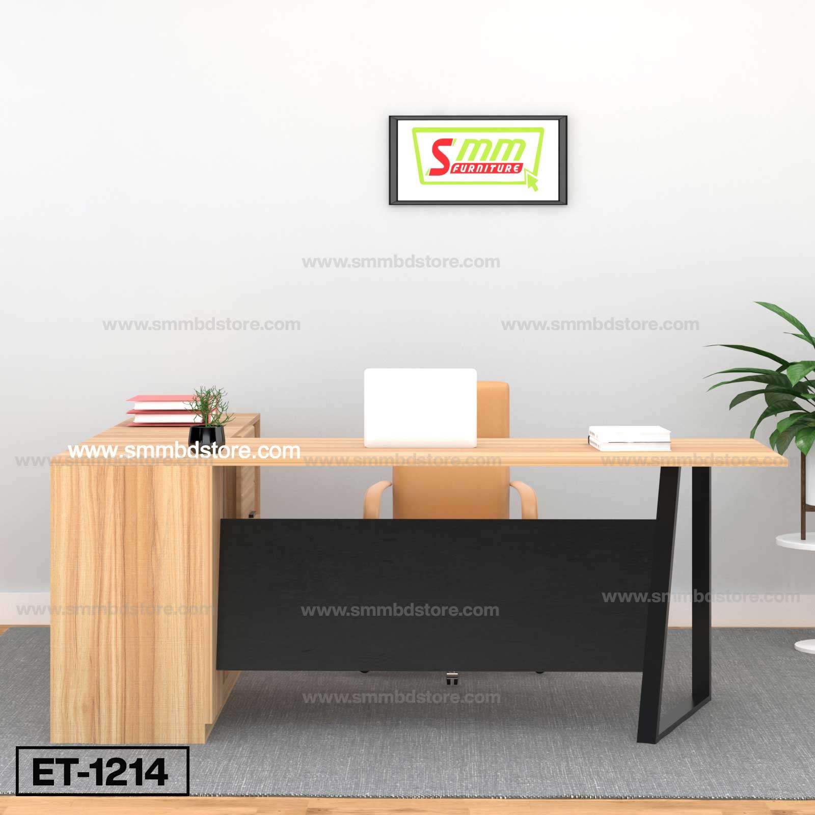 Modern wooden office desk with laptop, chair, plant, and wall art in minimalist workspace.