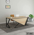 Modern office desk with metal frame, brown chair, laptop, potted plant, and wall clock