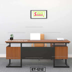 Modern wooden office desk with chair, laptop, potted plant, and wall art in minimalist workspace.