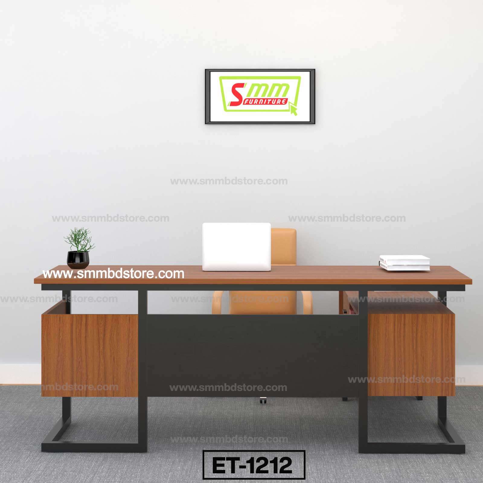 Modern wooden office desk with chair, laptop, potted plant, and wall art in minimalist workspace.