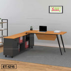 Modern L-shaped office desk with storage shelves, laptop, and decorative plant in workspace.