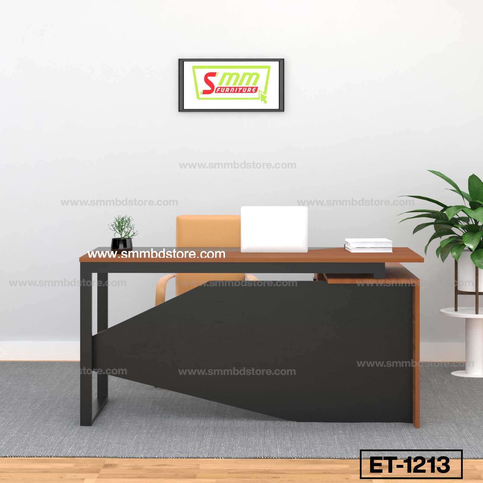 Modern office desk with laptop, chair, small plant, wall art, and indoor plant in minimal workspace.