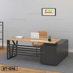 Modern office desk with wooden tabletop, metal frame, tan chair, laptop, and small plant