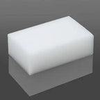 Rectangular high density white PU foam block on gray reflective surface