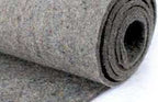 Close-up of a rolled grey felt fabric, suitable for crafts or insulation projects.